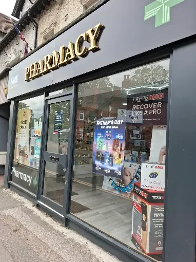 The shopfront of Oxshott Village Pharmacy on the High Street